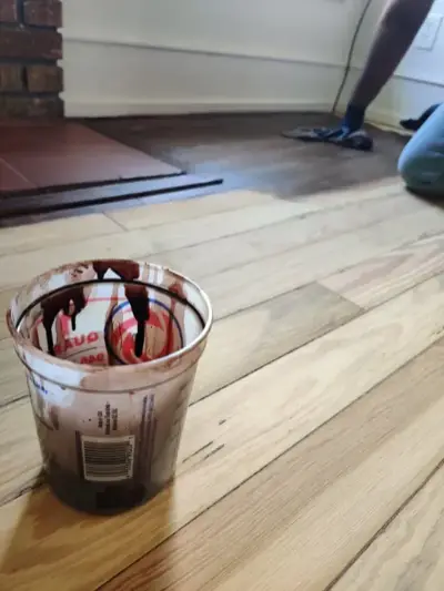 Fresh stain applied to white oak hardwood floor in Orlando — natural finish by 3 Floor Guys