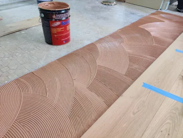 Glue-down hardwood floor installation with Fortane adhesive in Orlando, FL